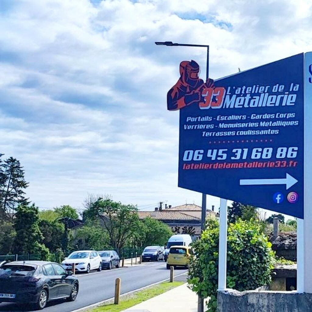 Panneau publicitaire bord de route Atelier de la Métallerie Portets