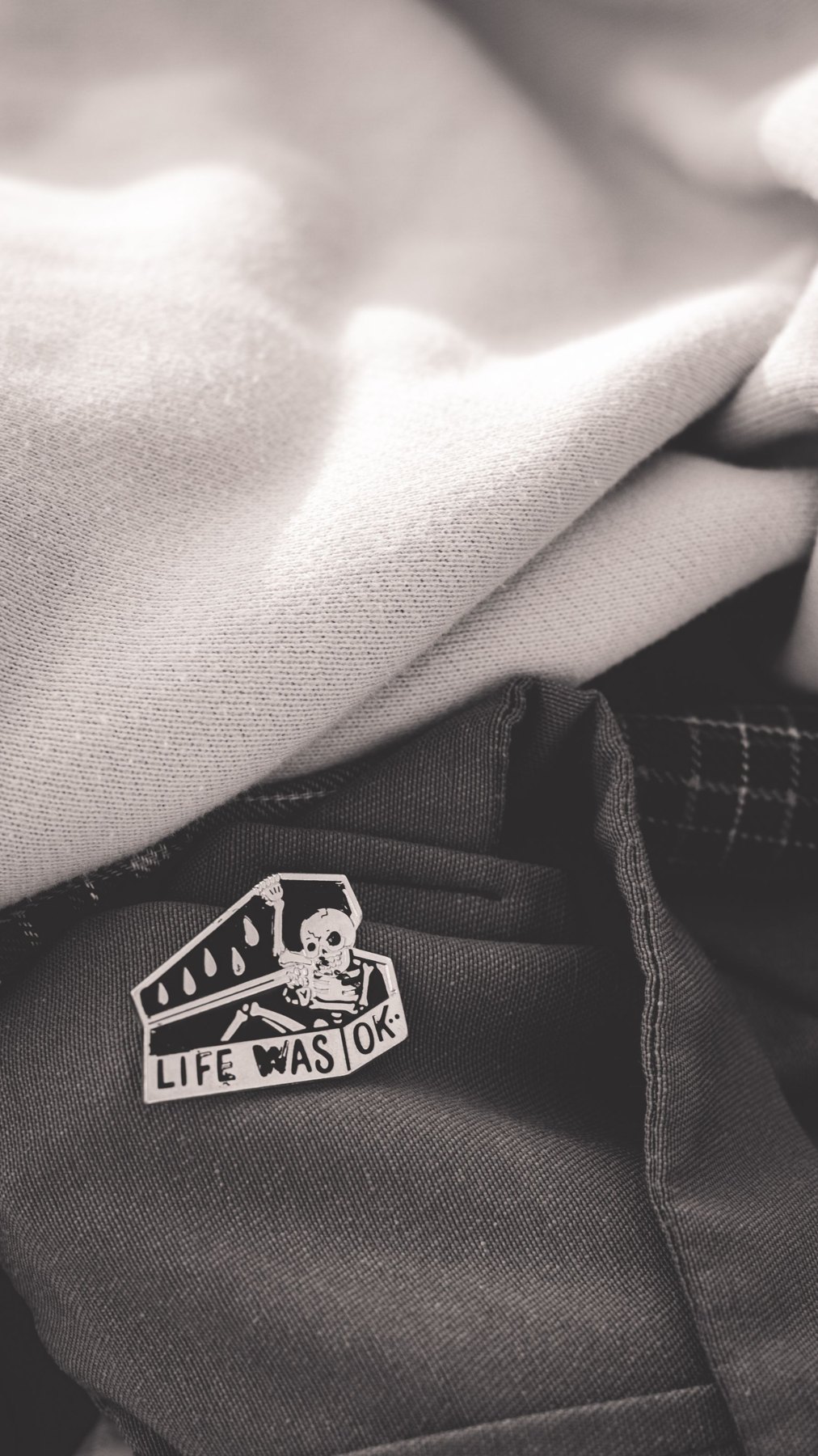 Écusson à logo cousu sur un textile